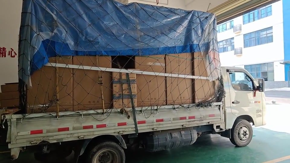 Packed equipment secured on a truck before dispatch.