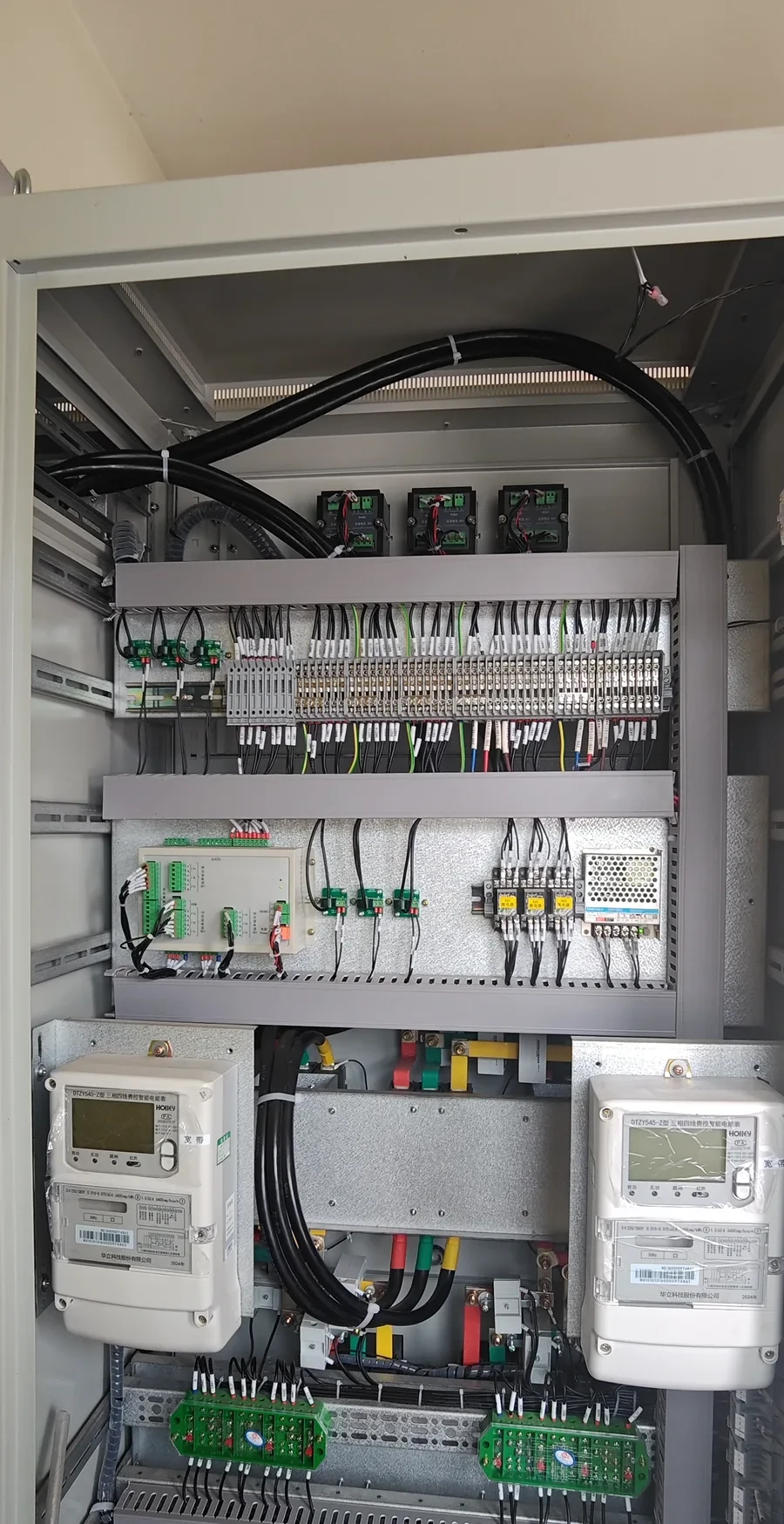 Actual cabinet wiring, terminals and installed components
